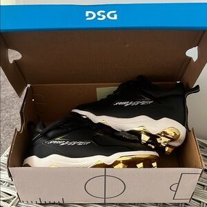 Stylish Black and Gold Kids cleats from d